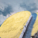 Untitled stone monument with Hebrew inscriptions under a cloudy sky.